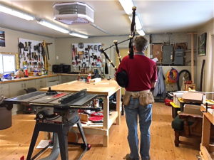 Phil with bagpipes in workshop